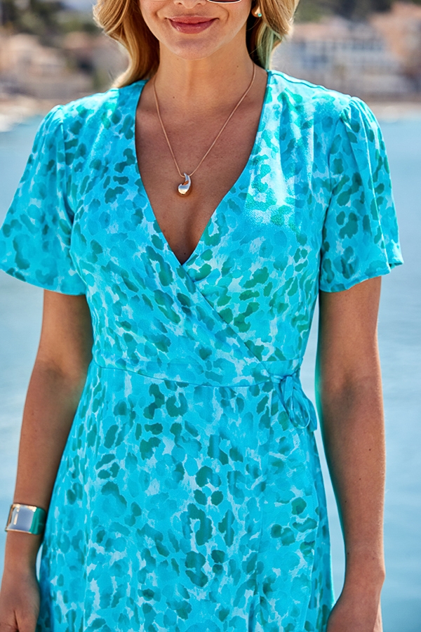 Aqua Blue Animal Print Ruffle Hem Wrap Dress