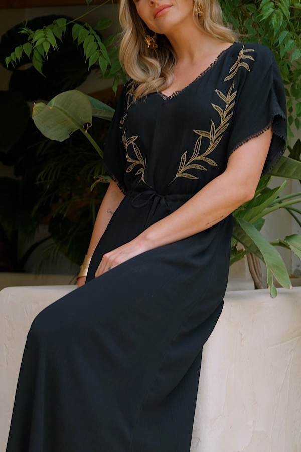 black and gold embroidered maxi dress 1970s Black Wool Gold Embroidered A-Line Caftan Maxi Dress